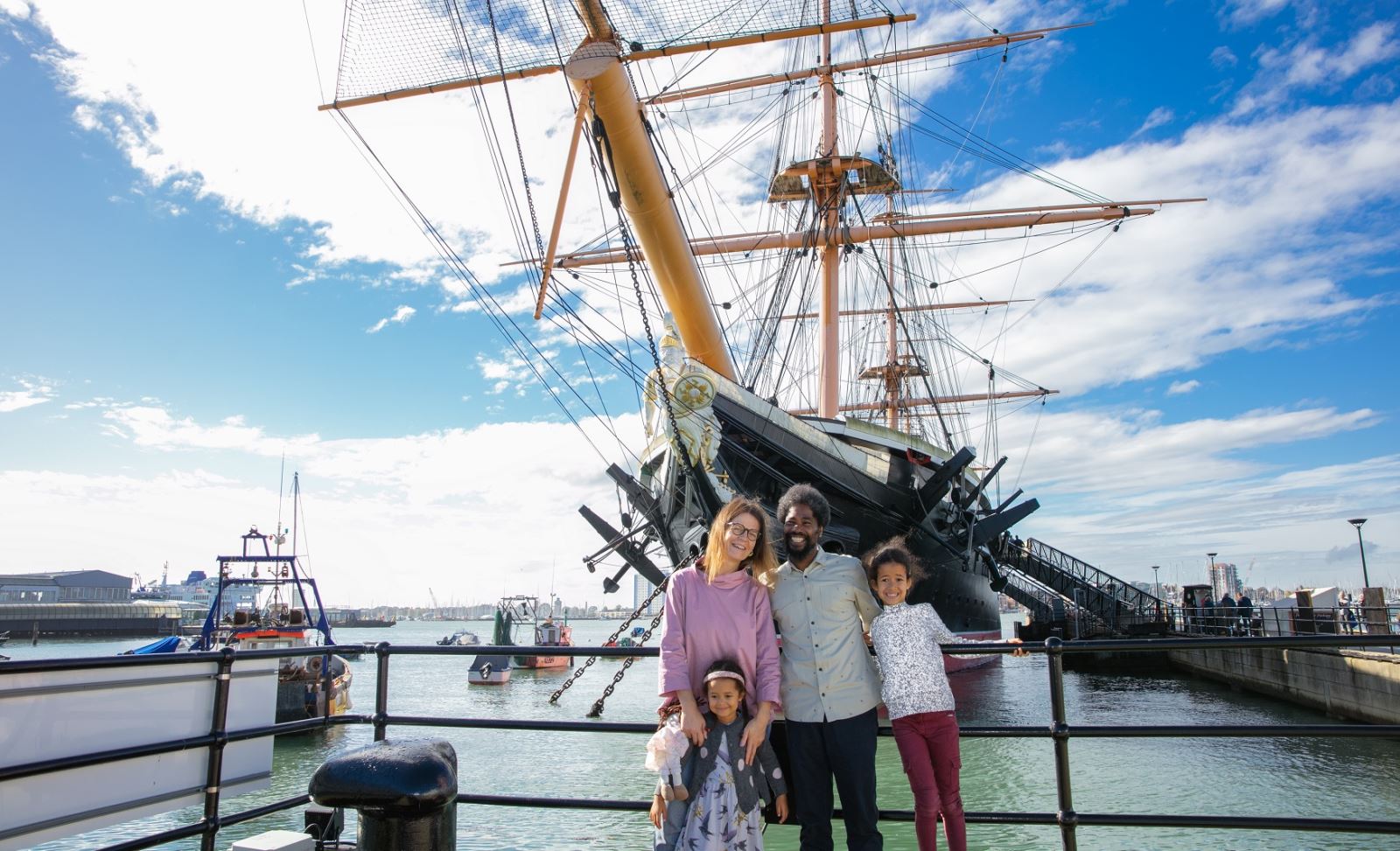 A family stood at HMS Warrior
